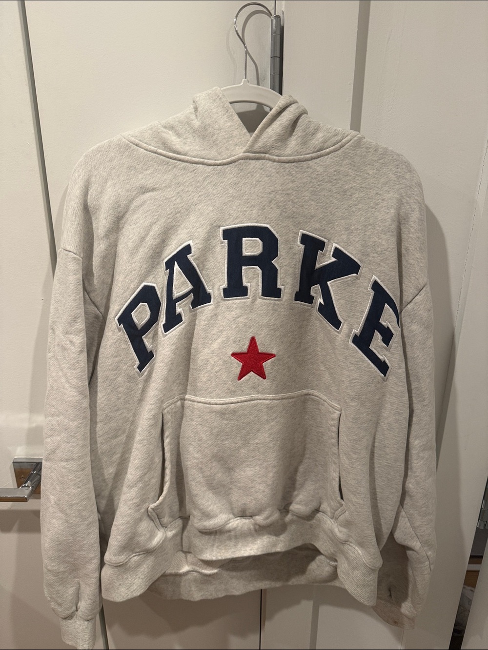 Parke Oversized Cream Hoodie with Navy Lettering and Red Star